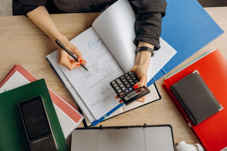 Top universities in USA for accounting shown by a professional reviewing financial statements